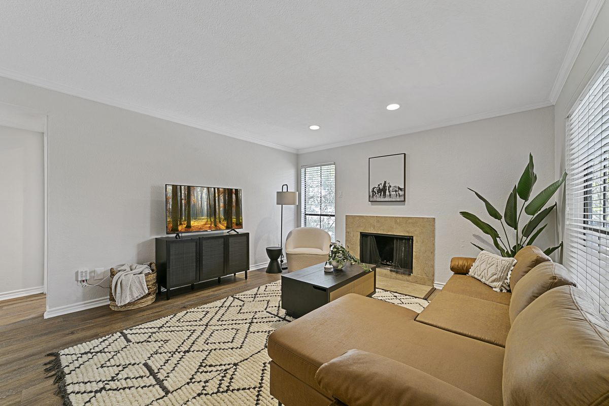 Living Room with Fireplace at Lakeside Apartments